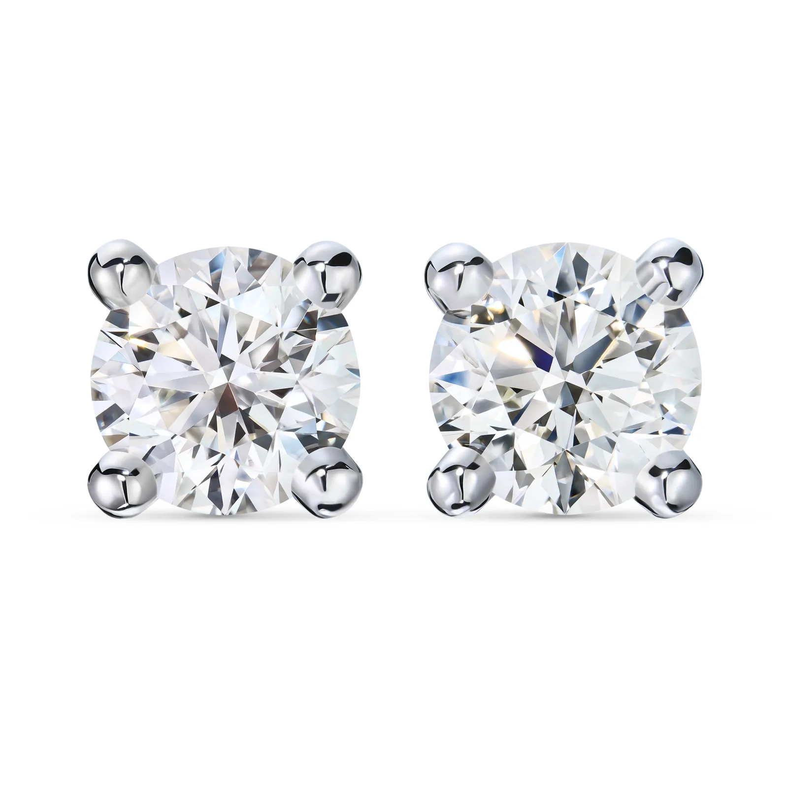 Stud earrings 1.02 + 1.00 ct. White diamonds 1.02 + 1.00 ct. Colour K, clarity VVS2 / VS1