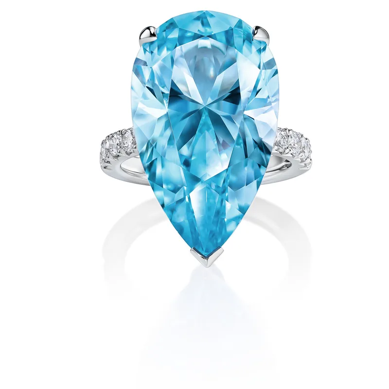 Ring 22.80 ct. Topaz 22.80 ct. Side diamonds 0.49 ct