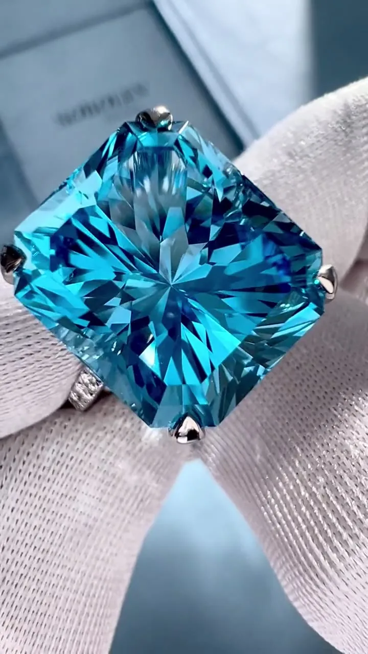 Ring 18.18 ct. Topaz 18.18 ct. Side diamonds 0.65 ct