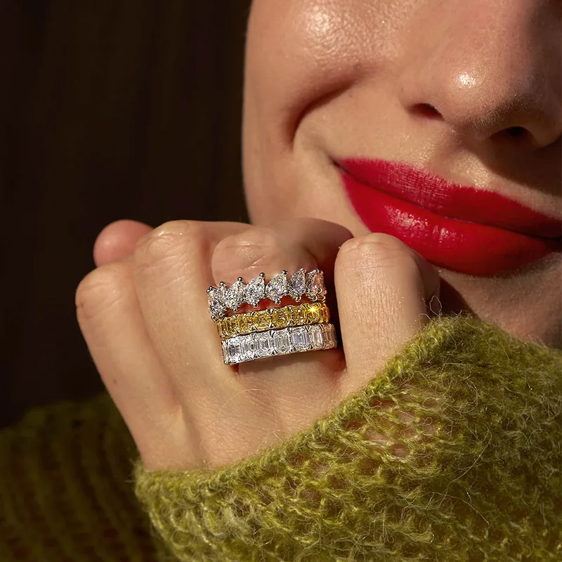 Three eternity bands: pears, yellow diamonds and emerald cuts