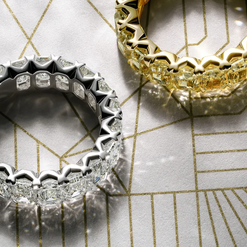 Diamond eternity bands in white and yellow gold